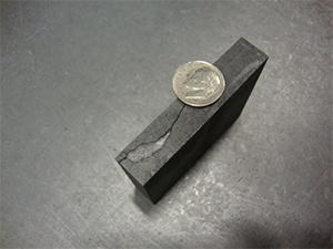 a flaw in the graphite manufacturing process